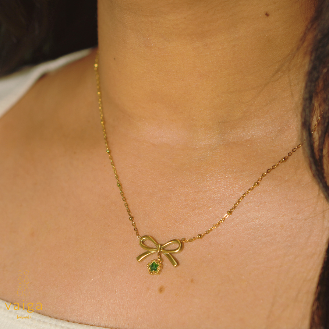 Bow Pendant Necklace with Green Charm