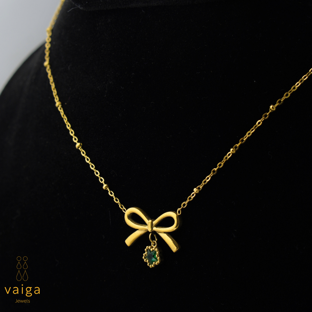 Bow Pendant Necklace with Green Charm