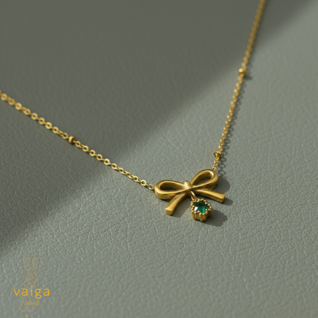 Bow Pendant Necklace with Green Charm