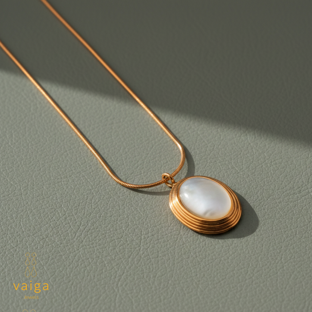 Gold-Toned Oval Pendant Necklace with Pearl Center
