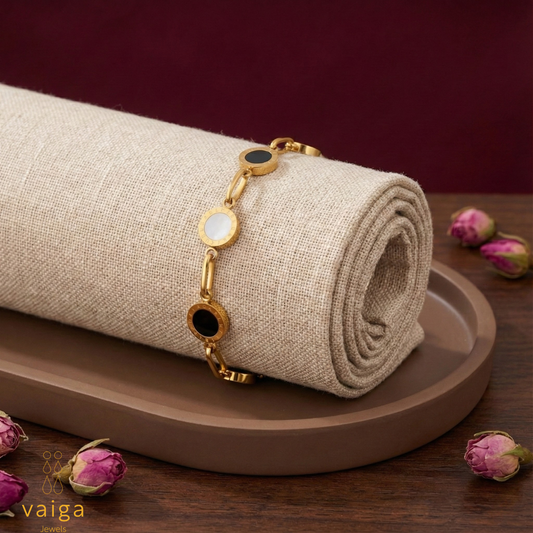 Vaiga Jewels: Gold Roman Numeral Disc Bracelet | Stainless Steel