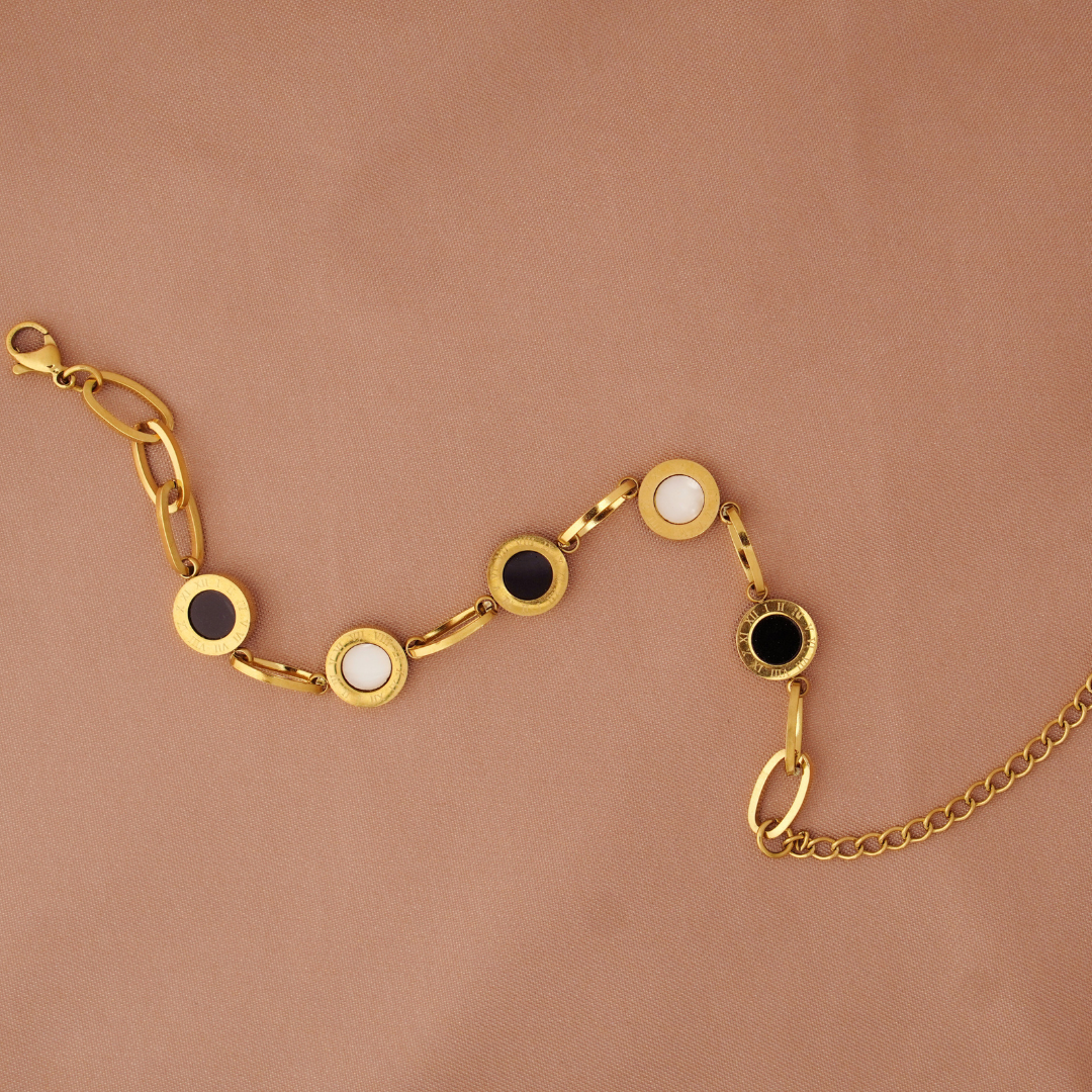 Vaiga Jewels: Gold Roman Numeral Disc Bracelet | Stainless Steel