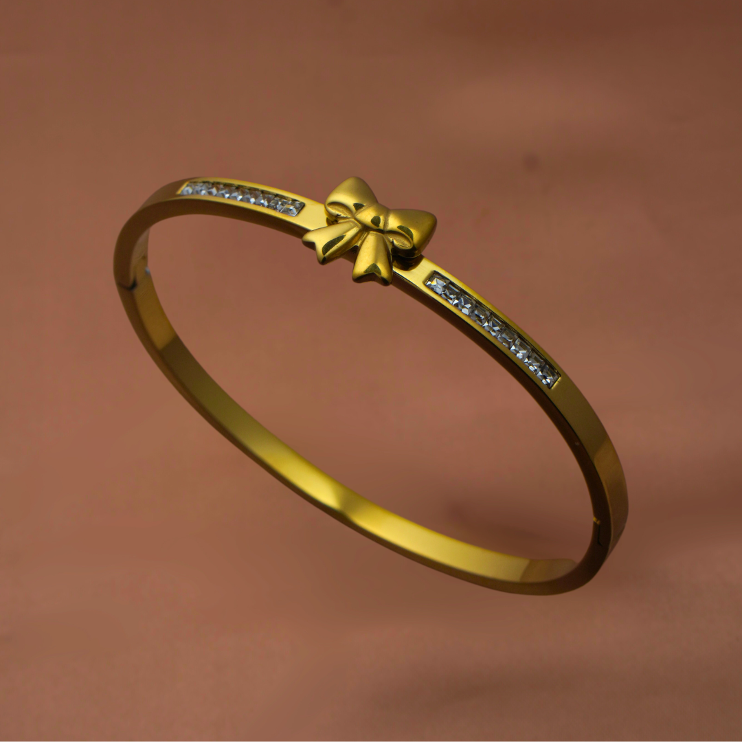 Vaiga Jewels Bow Charm Bracelet – Matte Gold with Crystals