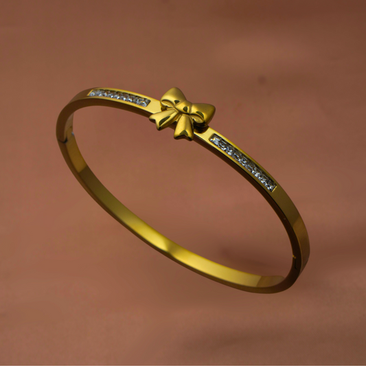Vaiga Jewels Bow Charm Bracelet – Matte Gold with Crystals